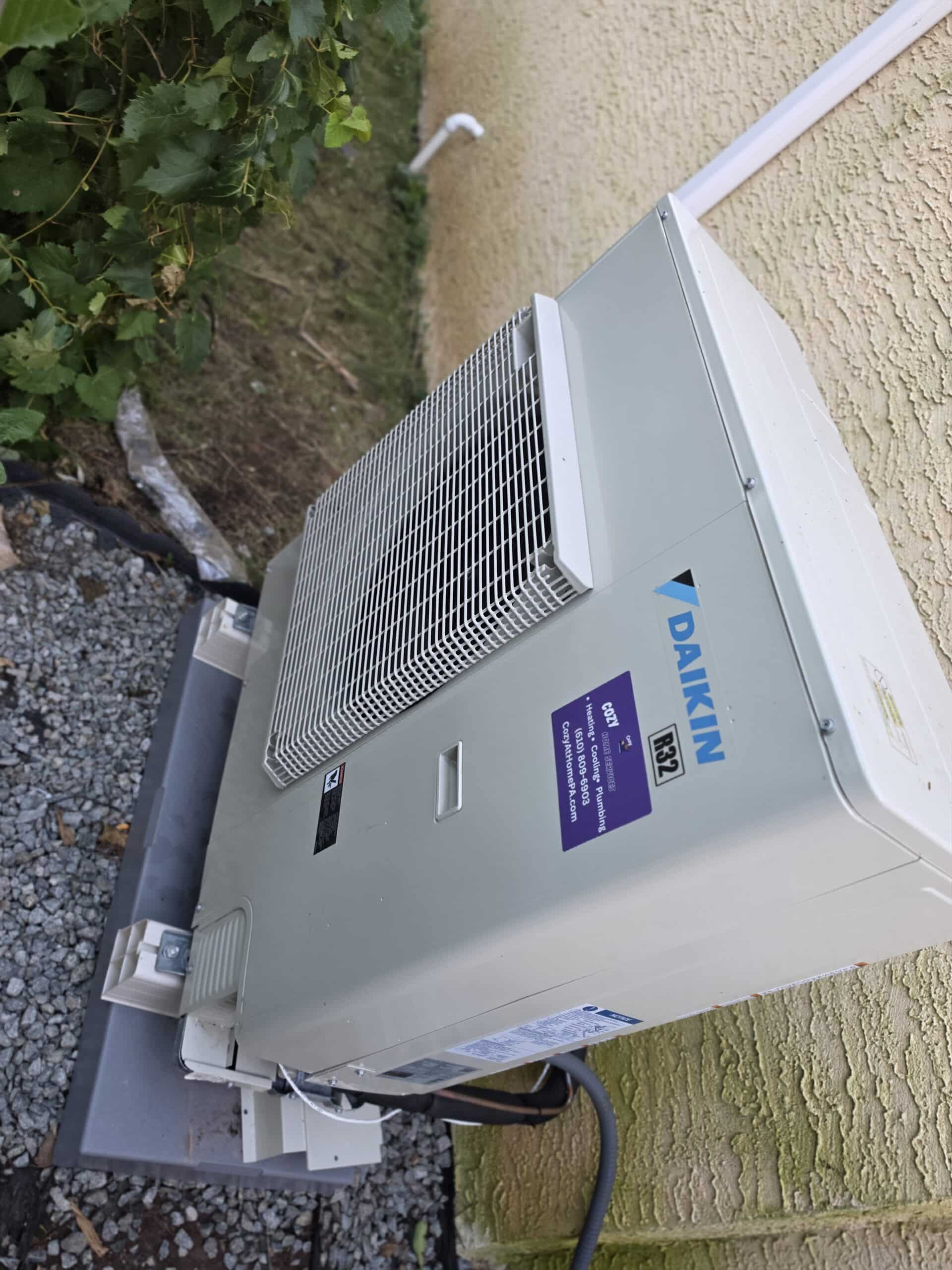 Daikin outdoor unit installed beside a home